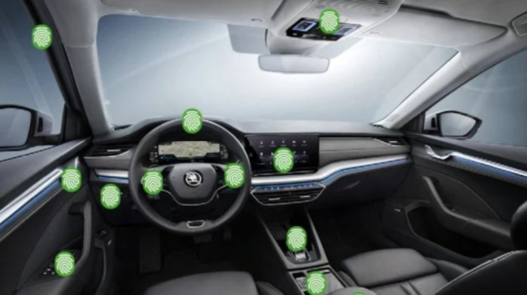 A car interior with digitally added fingerprints around it